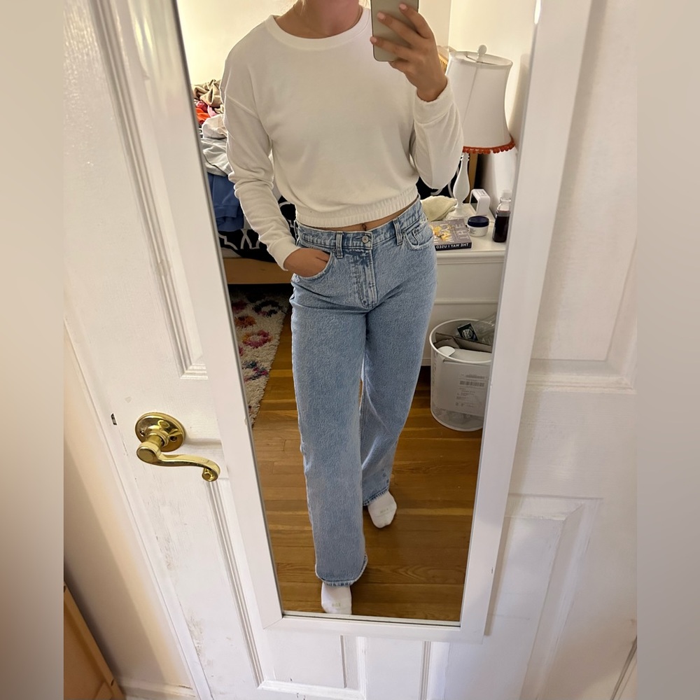 White sweatshirt.